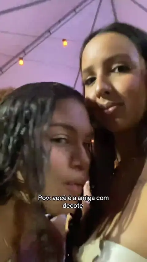 Lesbian Friends Playfully Grope Each Other's Breasts
