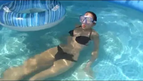 Lesbian Poolside Masturbation Scene with Two Girls