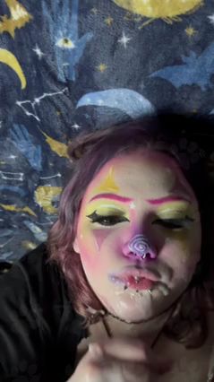 Lesbian Clown Deepthroats Girlfriend's Strap-On